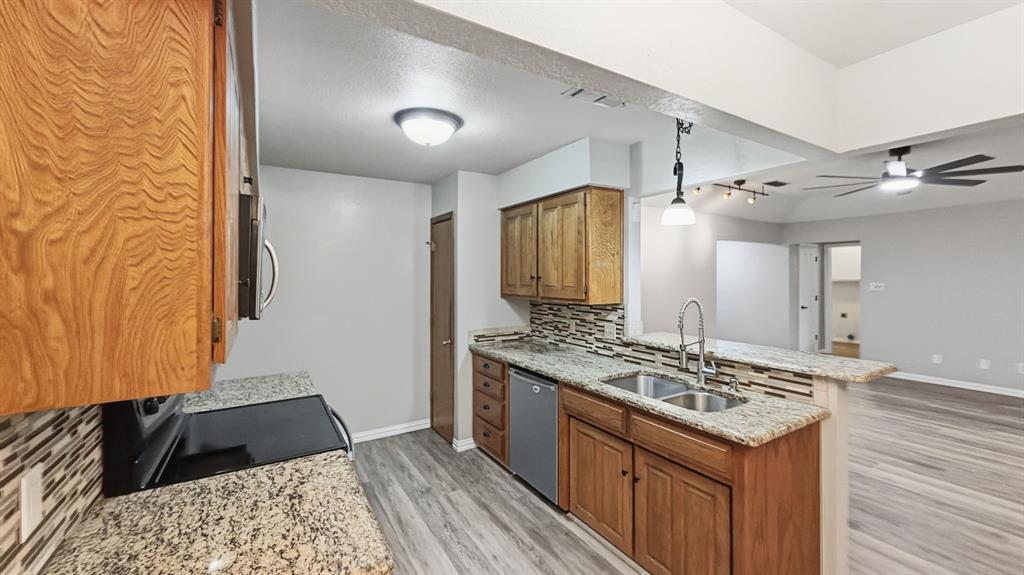 Looking from breakfast room to kitchen/living