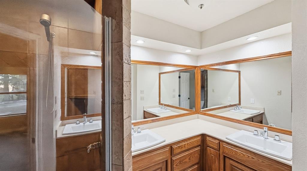 Primary bath with double sinks and walk in shower