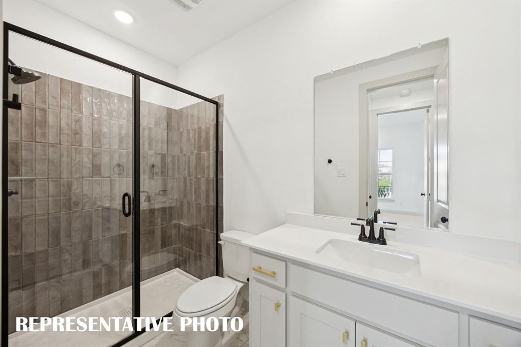 Friends and family will feel right at home in any of the beautfiully finished guest baths offered in our Versailles plan.  REPRESENTATIVE PHOTO