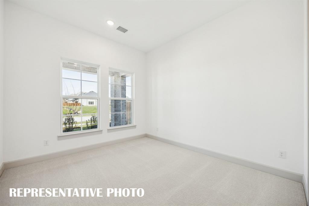 You'll find nicely sized secondary bedrooms in our Versailles plan.  REPRESENTATIVE PHOTO