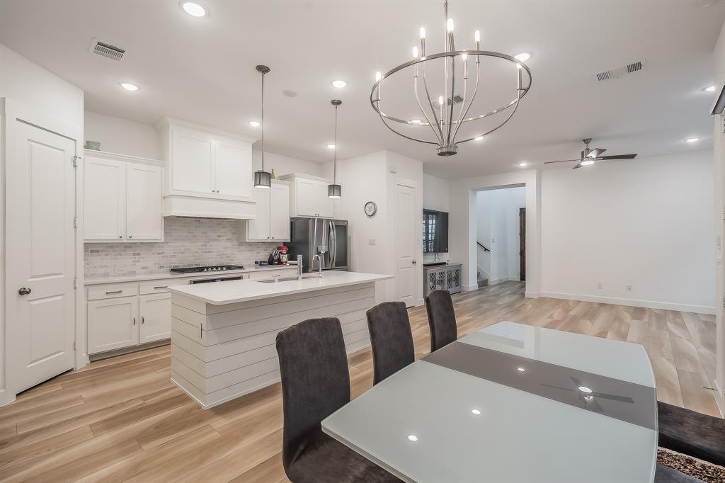 Kitchen and dining open to the living room