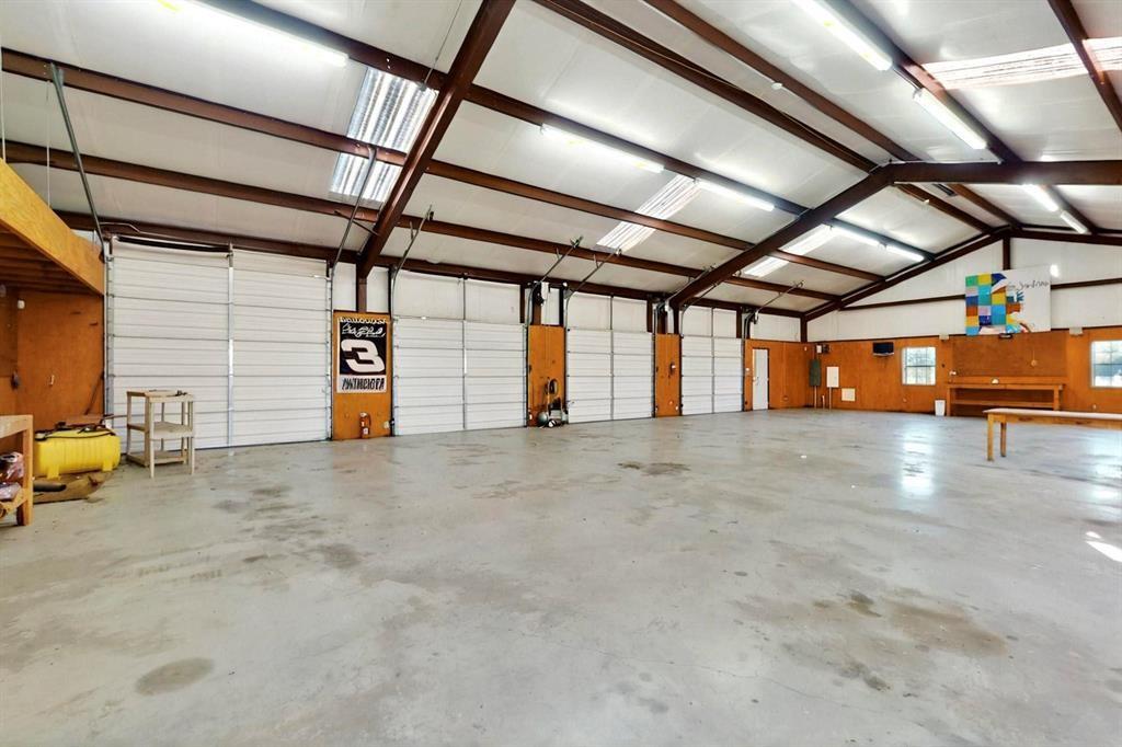 2 car attached garage plus 6 cars detached garage to house your precious vehicles