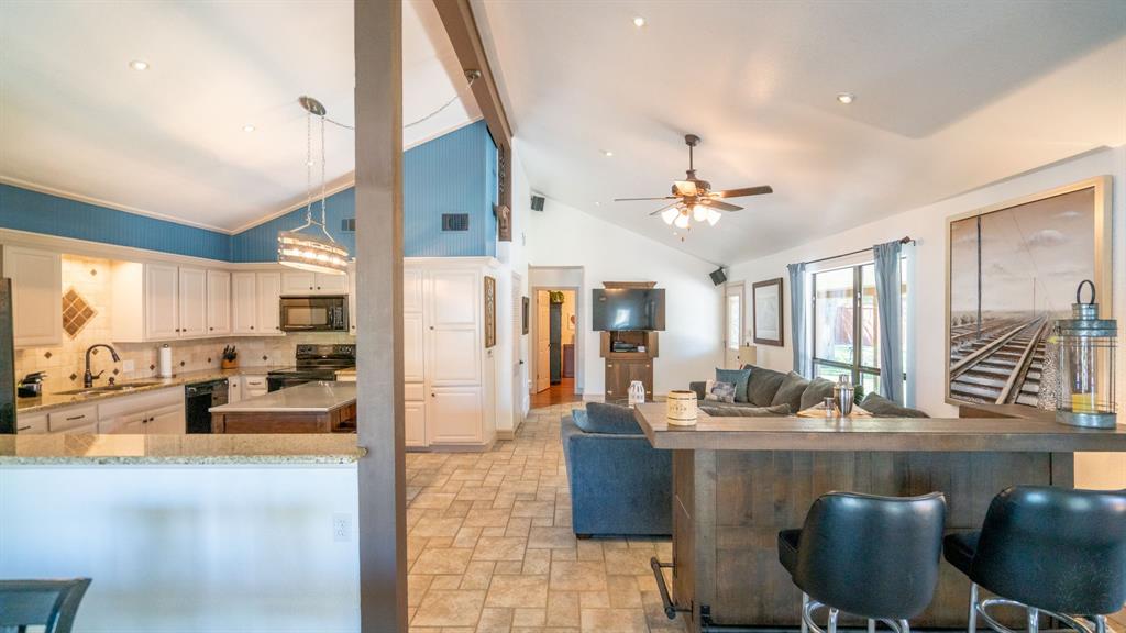 Vaulted ceiling and wood beams for a spacious feel