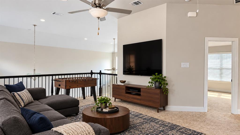 This image has been digitally staged to illustrate how the space could look. Please see the next photo for the property’s current, unstaged appearance.