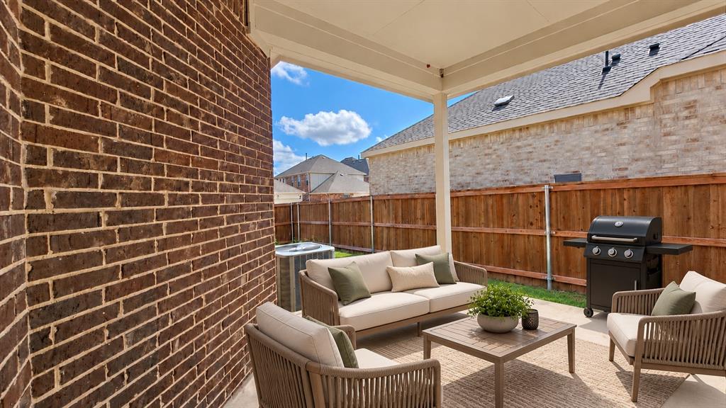 This image has been digitally staged to illustrate how the space could look. Please see the next photo for the property’s current, unstaged appearance.