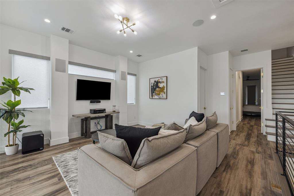 Living room with dark hardwood / wood-style floors