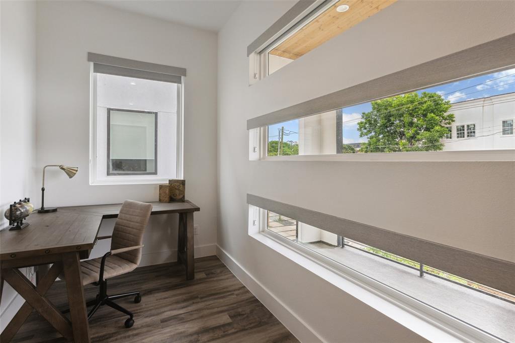Home office featuring wood-type flooring
