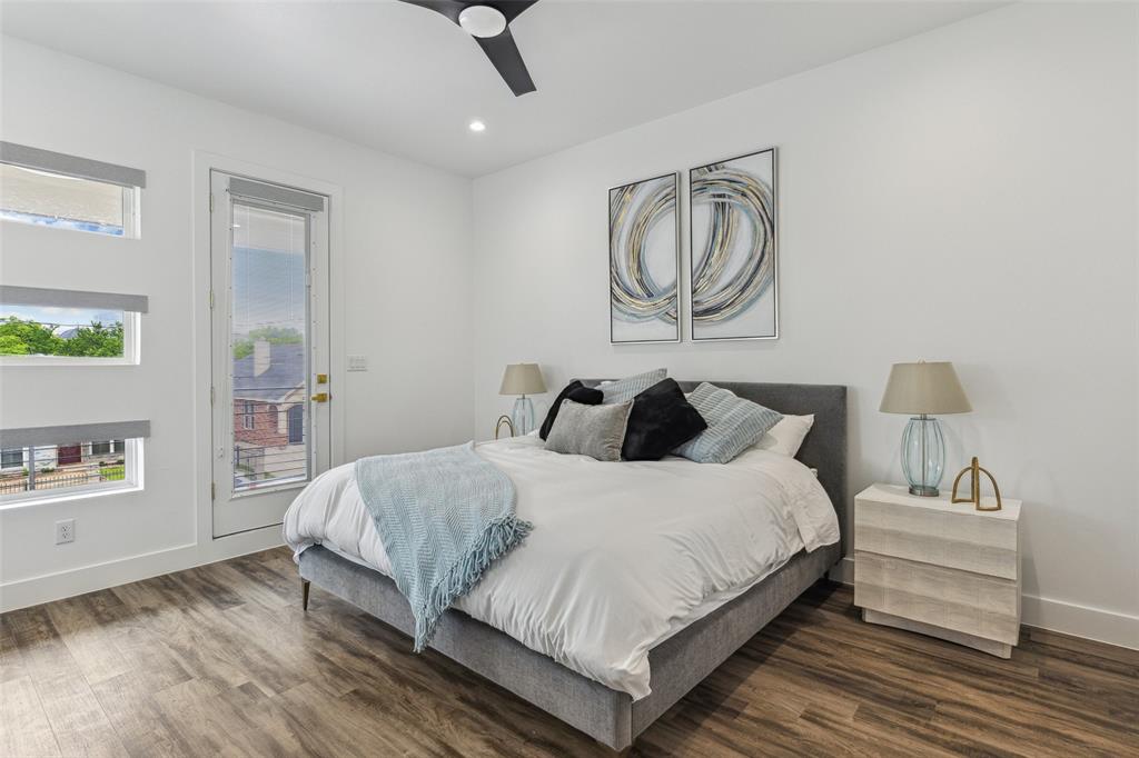 Bedroom with ceiling fan and dark hardwood / wood-style flooring