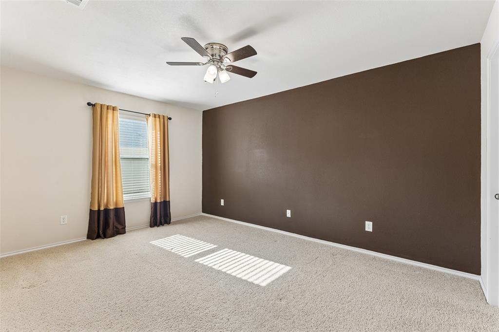 Secondary bedroom with walk in closet