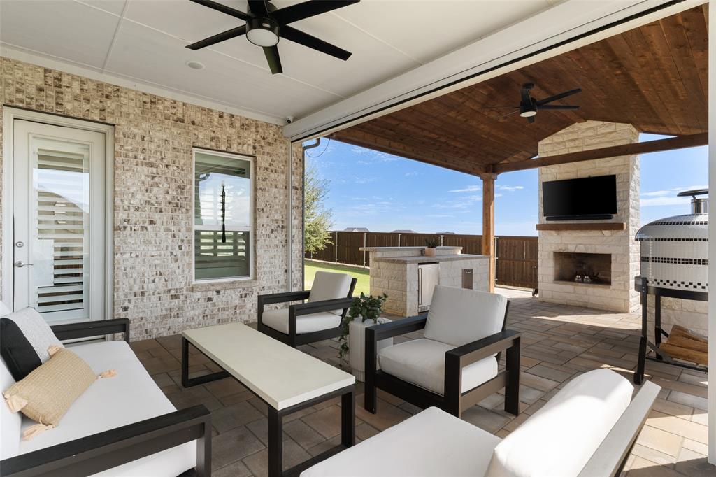 Outdoor Living area with auto shades!