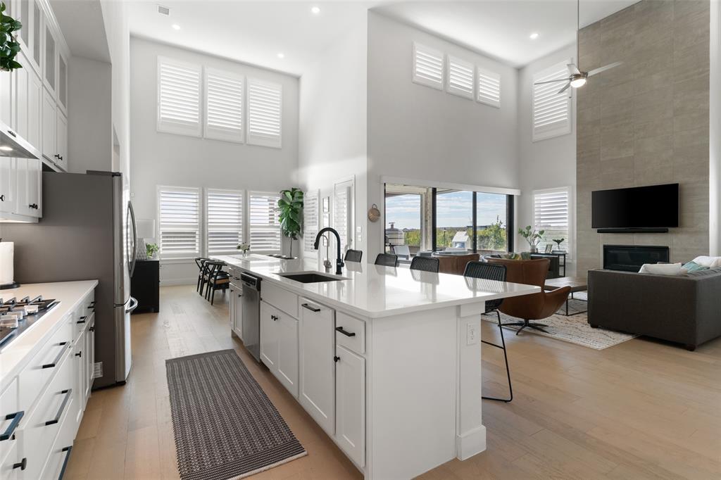 Open Concept w Plantation Shutters throughout