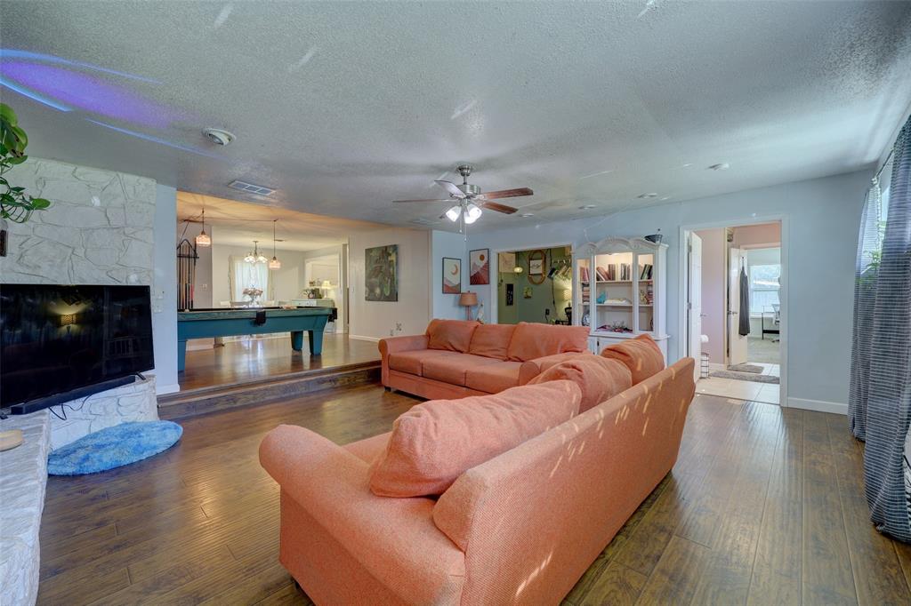 Primary bathroom and bedroom are accessed from the living room