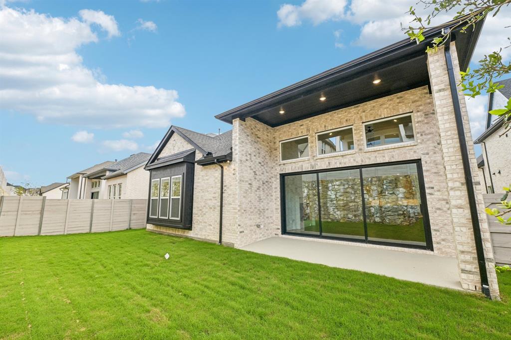 It's easy to take the party outside with a full wall slider leading to the spacious covered back patio and private fenced back yard!