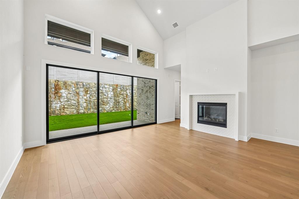 The full wall slider in this dream family room easily brings the outdoors in!