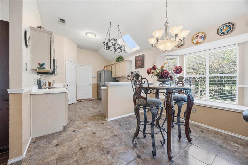 Breakfast area opens onto kitchen