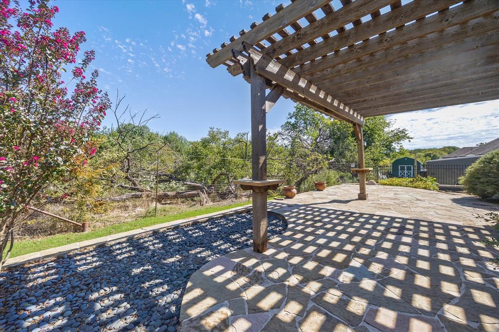 Expansive outdoor living areas overlook private back yard