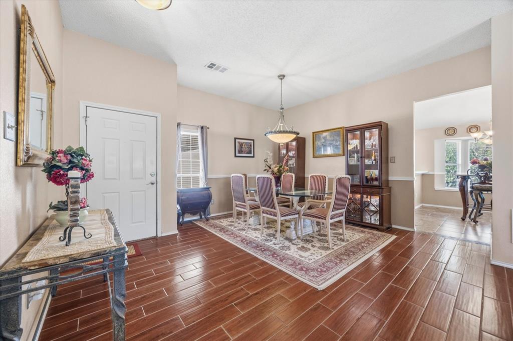 Lovely entry opens onto dining and living areas Lovely entry opens onto dining and living areas