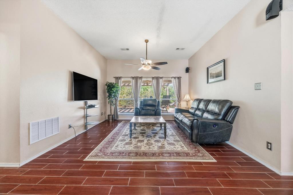Open floor plan features dining area overlooking living area