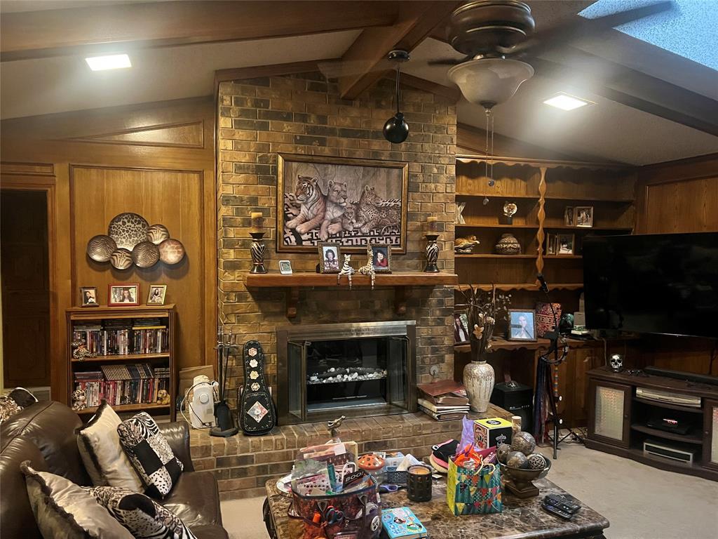 Built ins surround the fireplace.