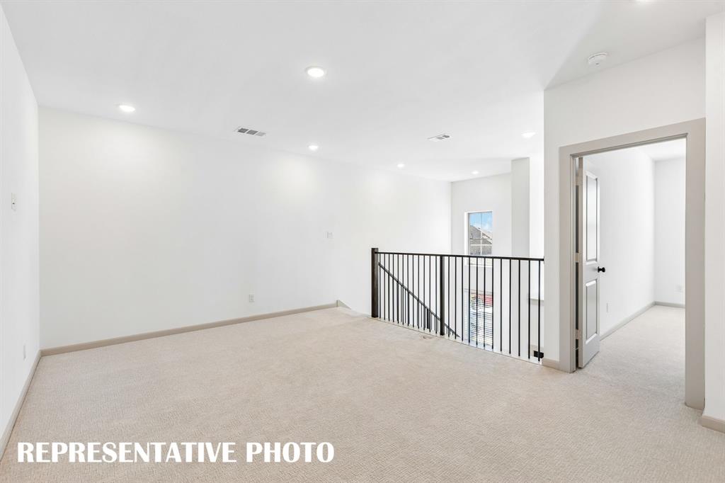 The upstairs game room offers a wonderful space for family fun time!  REPRESENTATIVE PHOTO