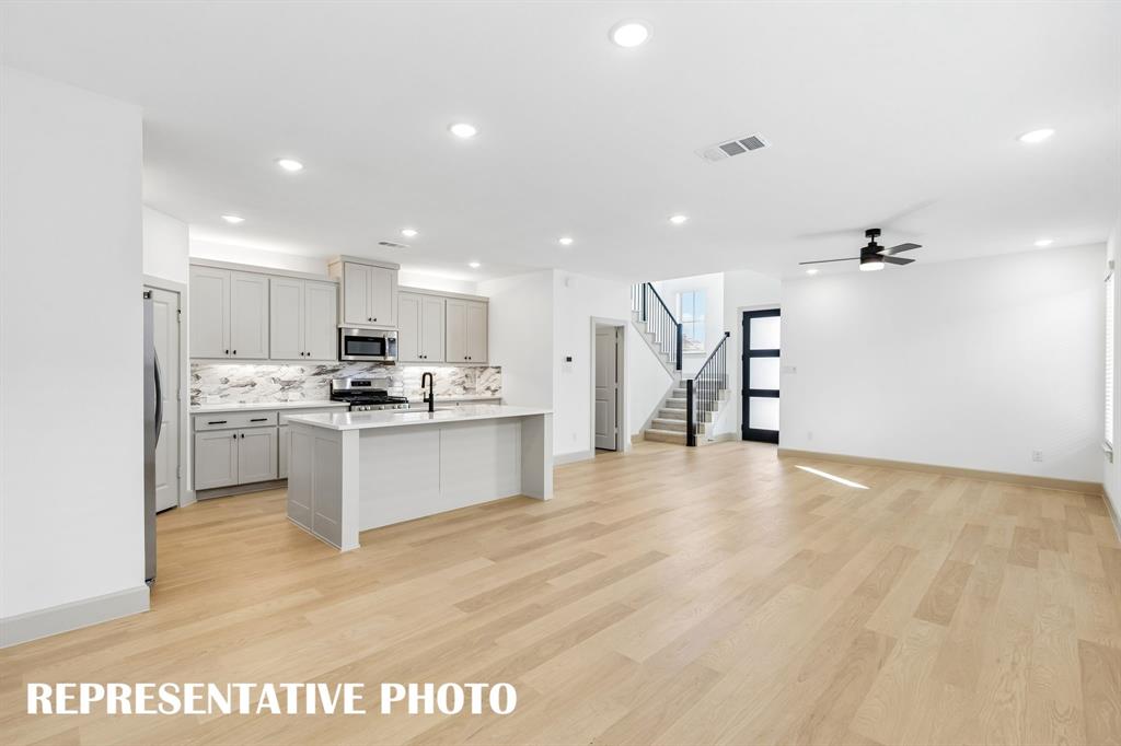 Open and flowing, this delightful floor plan was designed for entertaining. REPRESENTATIVE PHOTO Open and flowing, this delightful floor plan was designed for entertaining. REPRESENTATIVE PHOTO
