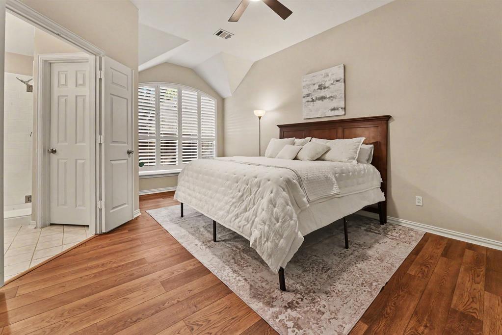 Primary bedroom with widow seat and room for sitting area