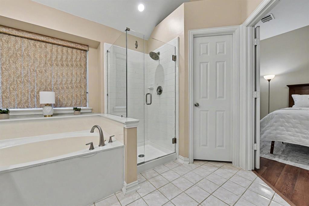 Primary bath with garden tub and walk-in shower