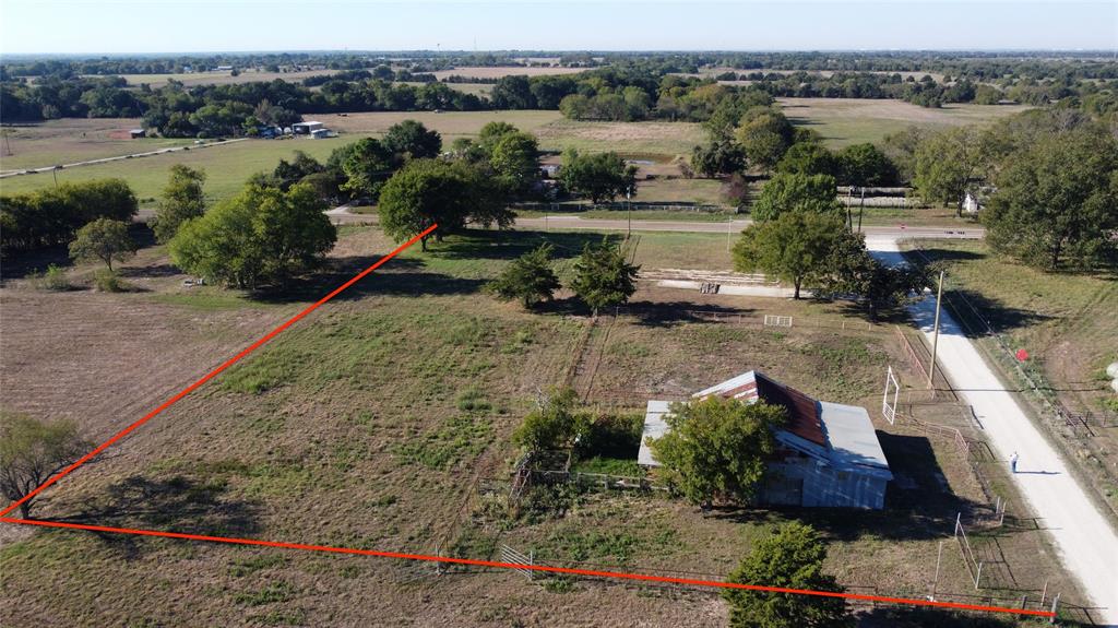 Expansive acreage featuring mature trees, open pasture, and direct road access Expansive acreage featuring mature trees, open pasture, and direct road access