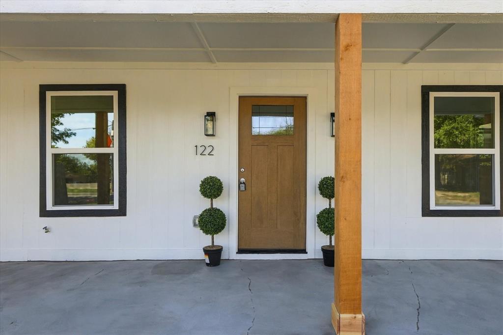 New windows, front door and fresh paint and trim!