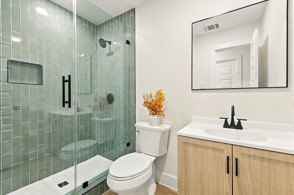 Brand new primary bathroom with gorgeous tiled shower.
