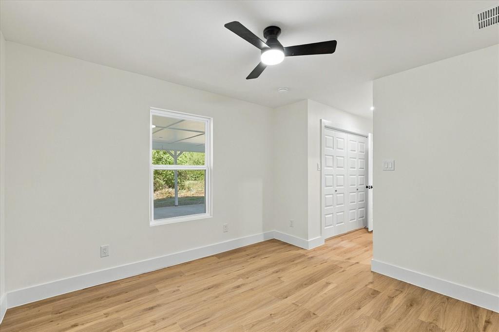 Primary bedroom with brand new closet.