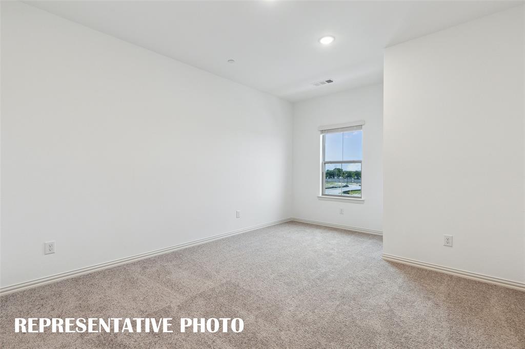 You'll find nicely sized secondary bedrooms in our Emily II floor plan.  REPRESENTATIVE PHOTO