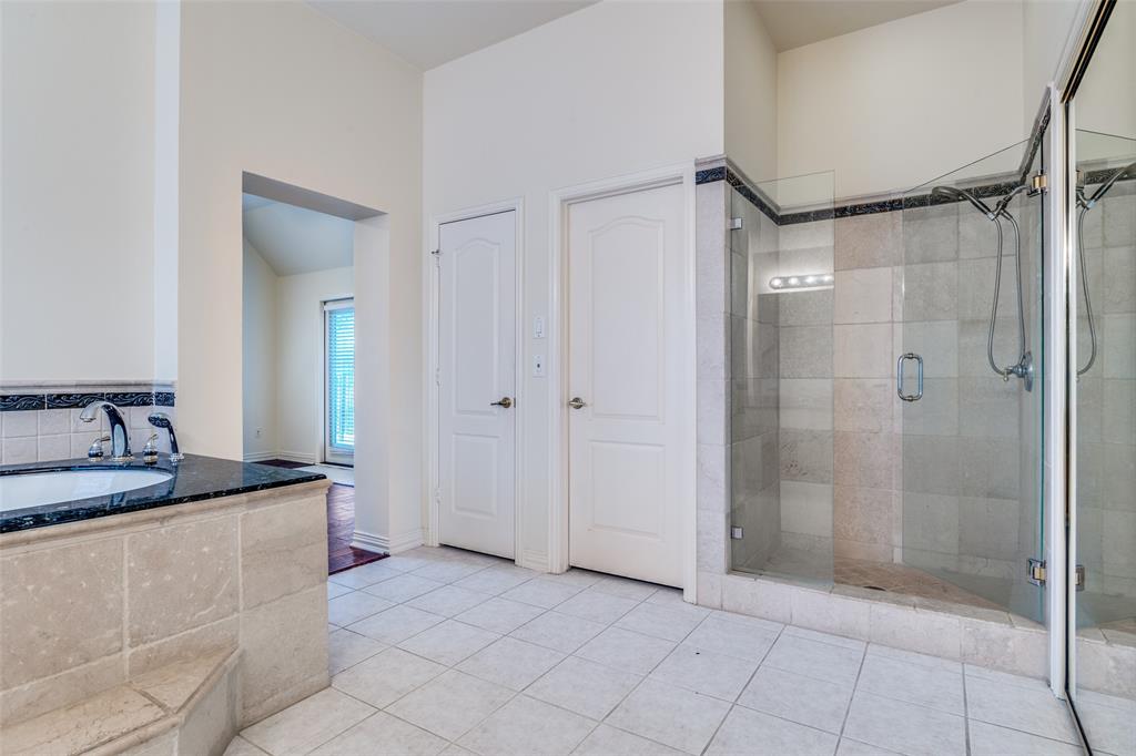 Oversized primary master bedroom with Jacuzzi tub & shower