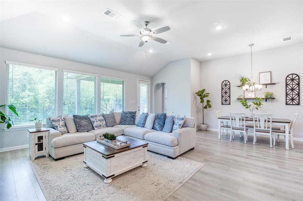 Living room flows seamlessly to dining. Perfect for entertaining!