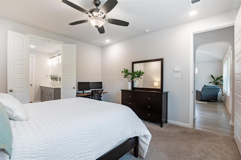Primary suite situated privately from secondary bedroom.