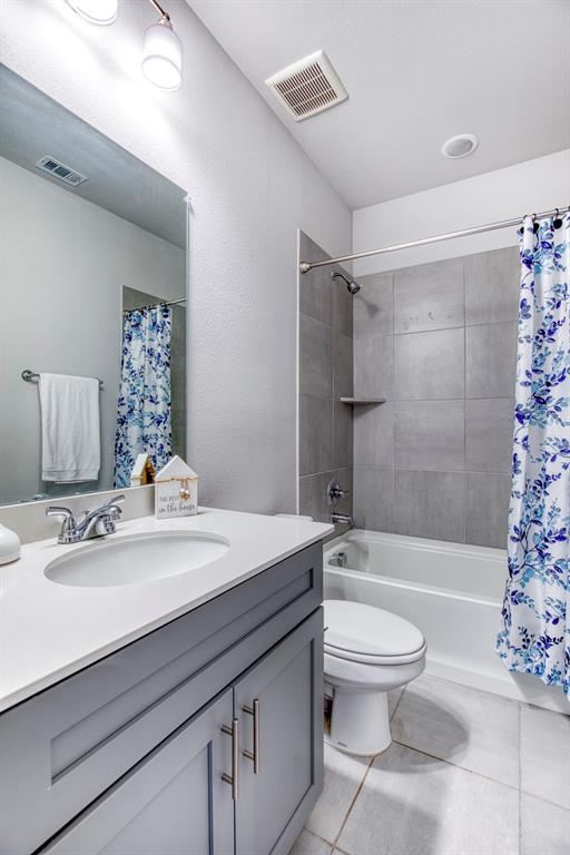 Secondary downstairs full bath.