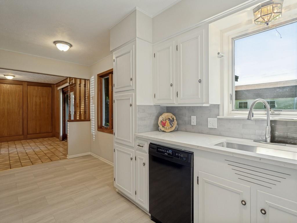 View from kitchen to Breakfast area& dining