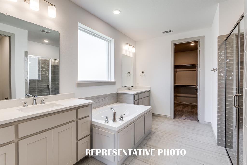 Plenty of space for two in this wonderful owner's bath.  REPRESENTATIVE PHOTO