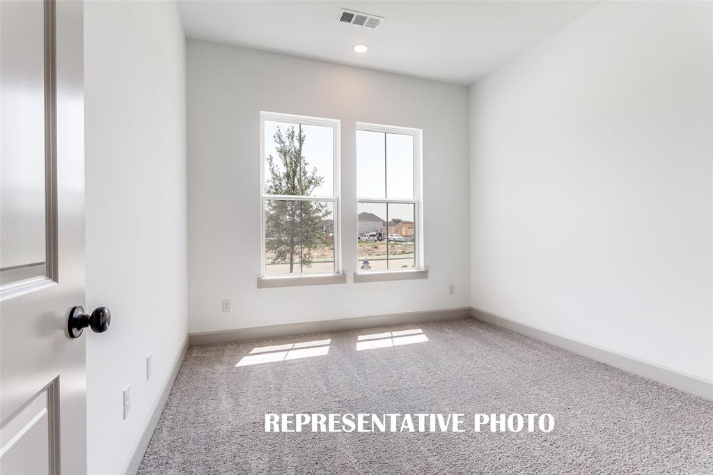You'll find nicely sized secondary bedrooms in our Toulouse floor plan.  REPRESENTATIVE PHOTO
