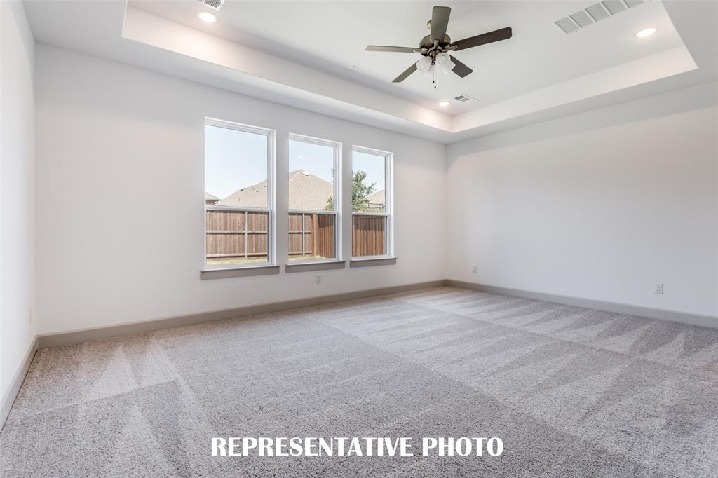 The peaceful owner's suite is located at the back of the home for additional privacy. REPRESENTATIVE PHOTO The peaceful owner's suite is located at the back of the home for additional privacy. REPRESENTATIVE PHOTO