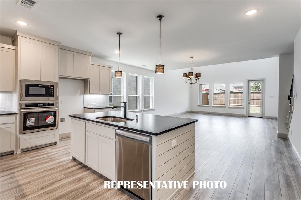 Featuring the perfect open concept design, entertaining is a breeze in our Toulouse floor plan. REPRESENTATIVE PHOTO Featuring the perfect open concept design, entertaining is a breeze in our Toulouse floor plan. REPRESENTATIVE PHOTO
