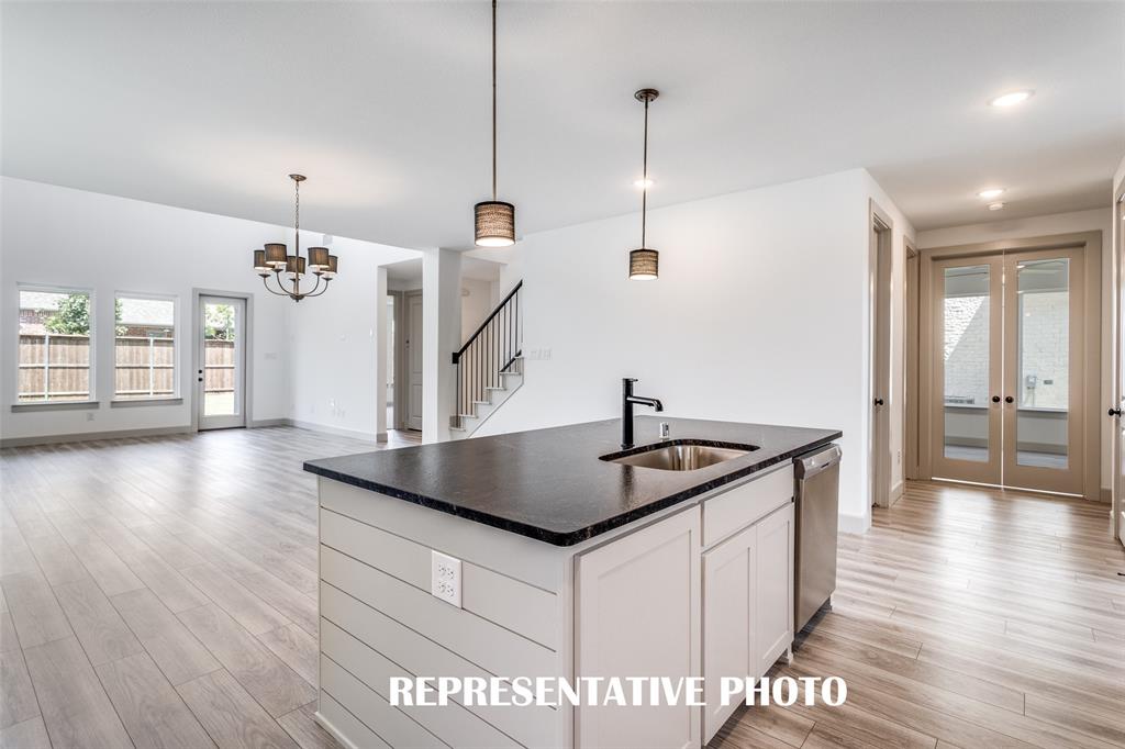 The large kitchen island is the perfect place for a quick family meal or after school homework station. REPRESENTATIVE PHOTO The large kitchen island is the perfect place for a quick family meal or after school homework station. REPRESENTATIVE PHOTO