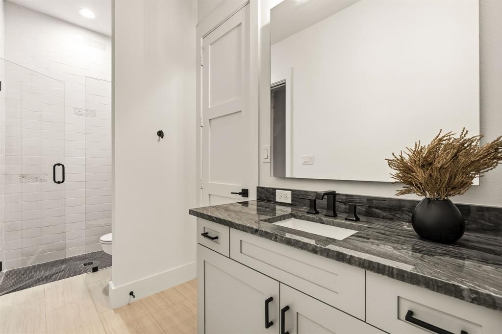 Ensuite bathroom to secondary downstairs bedroom