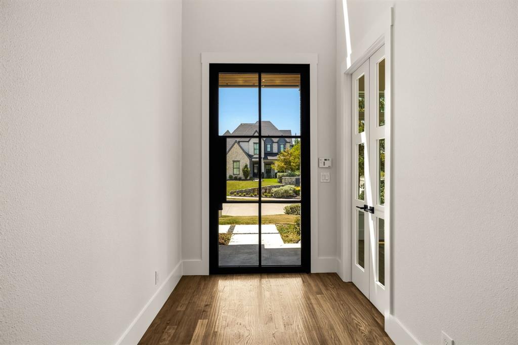 Front door with two french doors leading to office
