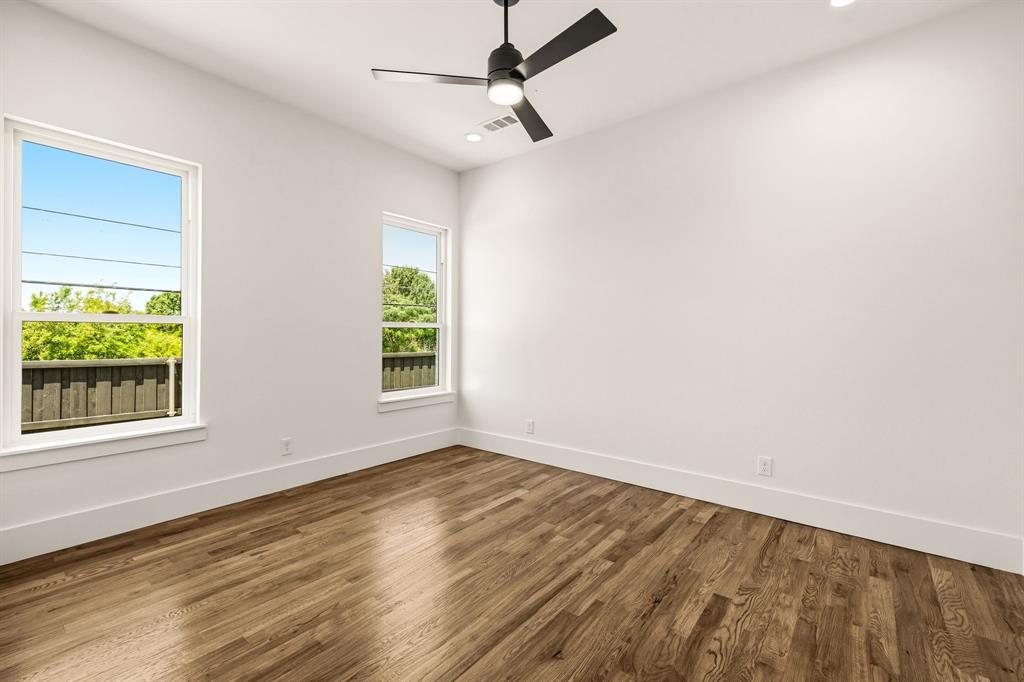 Secondary bedroom downstairs with hardwoods - great for guest bedroom or MIL
