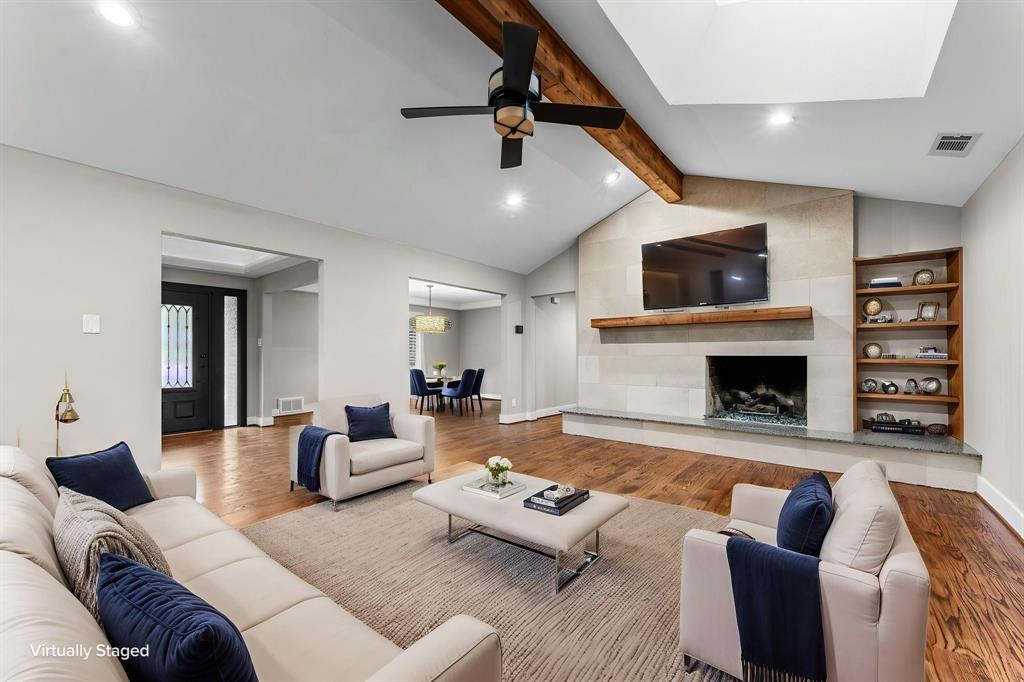 Virtually staged living room and FP Virtually staged living room and FP