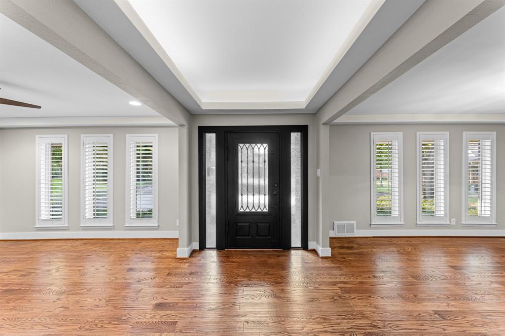Entryway featuring a coffered ceiling