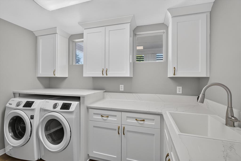 Laundry downstairs off kitchen.