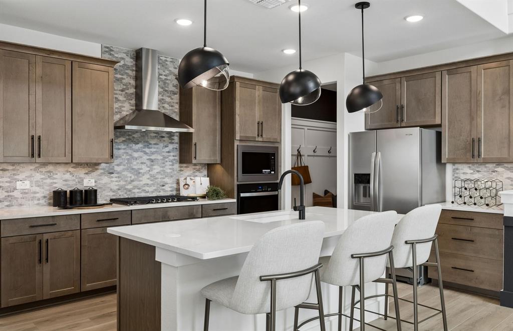 *Model Representation - Spacious kitchen with eat-in bartop island *Model Representation - Spacious kitchen with eat-in bartop island