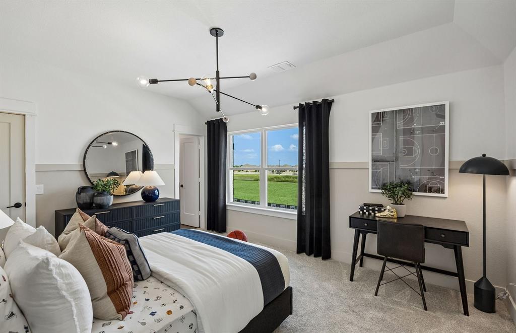 *Model Representation - Spacious secondary bedroom with large windows